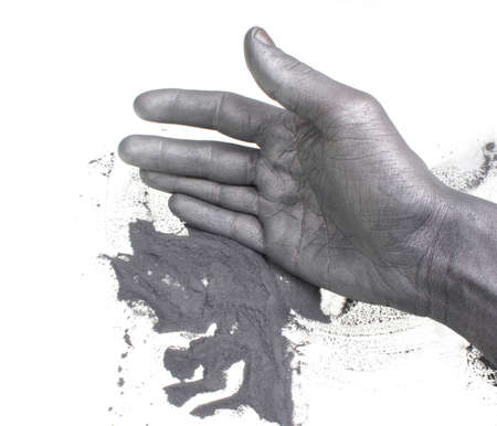 Gunpowder and hand on a white backgroundの写真素材