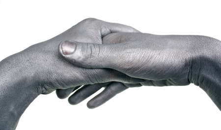 Handshake painted silver on a white backgroundの写真素材