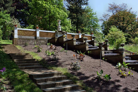 Potsdam, Germany - May 19, 2013: Fountain with sculptures of flowers in a park Sanssouciのeditorial素材