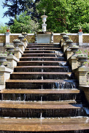 Potsdam, Germany - May 19, 2013: Fountain with sculptures of flowers in a park Sanssouciのeditorial素材