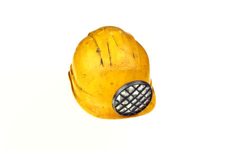 Yellow safety helmet or hard hat isolated on white backgroundの写真素材