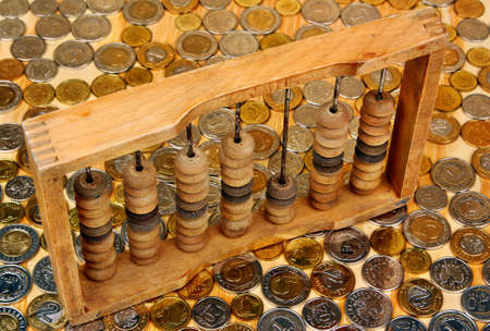 Abacus on the polish money coins backgroundの写真素材