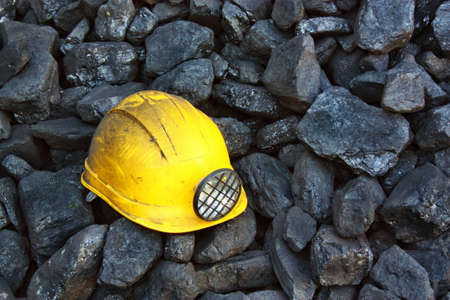 Helmet on top of the coal miningの写真素材