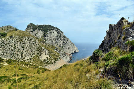 Beautiful sea bay with turquoise water, beach and mountains, Cala Figuera on Cap Formentor, Mallorca, Spainの写真素材