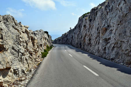 Open coastal road winding through to lighthouse Cap Formentor, Mallorca, Spainの写真素材