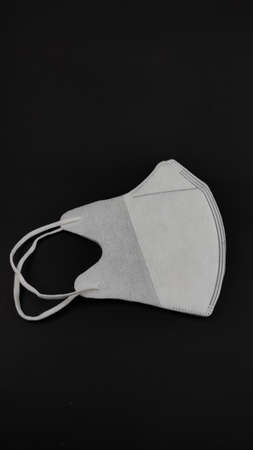 White mask isolated on a black background, Not Focusの写真素材