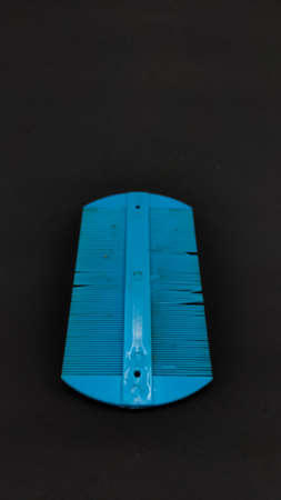 Blue dirty comb isolated on black background, Not Focusの写真素材