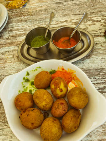 Papas arrugas al mojo Canary islands wrinkled potatoes with green and red saucesの写真素材
