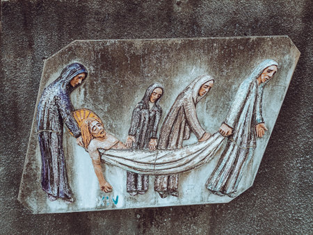 Mosaic on the wall of a church. Sculpture station Way of the Cross of the Cathedral of St. Paul in Abidjan, Ivory Coastの写真素材