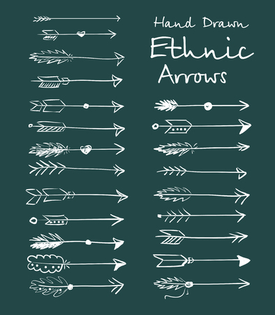 Collection of ethnic arrows hand-drawn on a green background for your design. illustrationの写真素材