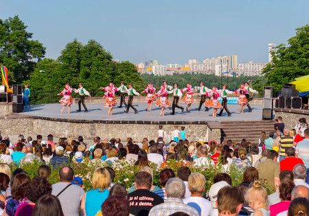 KIEV, UKRAINE - July 22 , 2016: Ukraina School of Dance Ensemble girls and boys dressed in traditional red Ukrainian embroidered costume clothes dancingのeditorial素材