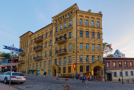 An old five-story building with a stone pavementのeditorial素材