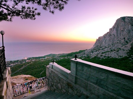Luxurious sea view away from the horizon and enchantingly pale pink sunsetの写真素材