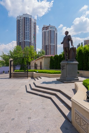 Monument to Heydar Aliyev in the middle of a beautiful square against the background of high modern housesのeditorial素材
