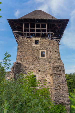 partially restored tower of a magnificent neviitskogo castle on a mountain near the river Tisza. Uzhhorod Ukraineのeditorial素材
