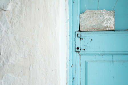 Detail of blue retro old door in mediterranean Greeceの写真素材