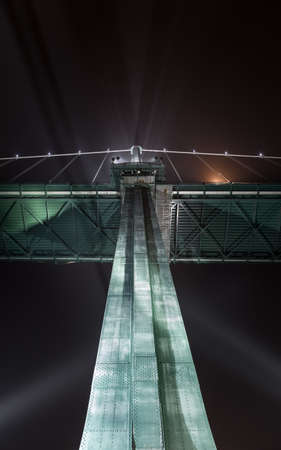 The north tower of the Lions Gate Bridge with haze from the Vancouver Island forest fires of the...