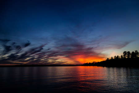 Sunset against cirrus clouds on Lake Rosseau.