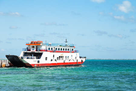CANCUN, QR, MEXICO - FEB 11, 2018: Cancun to Isla Mujeres passenger ferry leaving Cancun on a sunny...