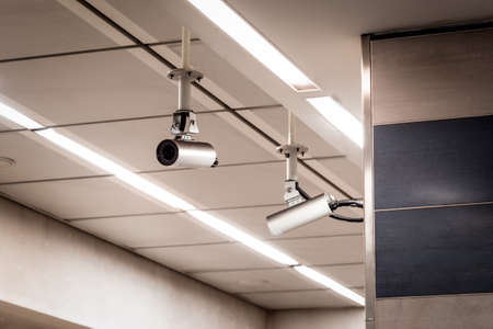 CCTV cameras on a roof at a subway station.の写真素材