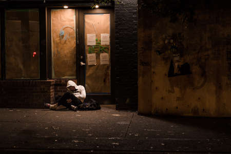 VANCOUVER, BC, CANADA - SEPT 28, 2019: A homeless drug addict on the streets of Vancouvers downtown eastside.のeditorial素材