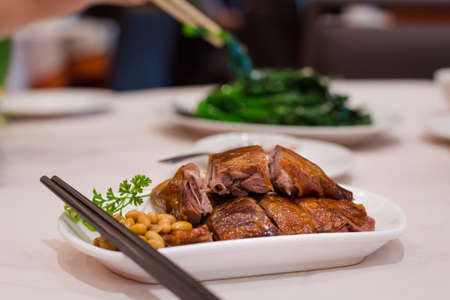 A delicious plate of bbq duck at a Chinese dim sum restaurant.
