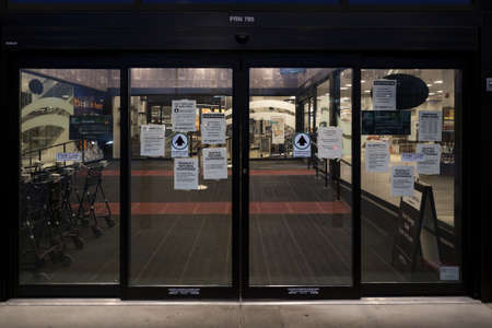 DOWNTOWN VANCOUVER, BC, CANADA - MAR 23, 2020: A health notice sign in the front of a store...