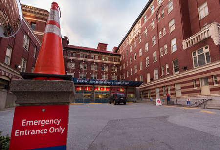 DOWNTOWN VANCOUVER, BC, CANADA - APR 01, 2020: A front view of the emergency admissions area of St Pauls hospital in Vancouver during the Covid 19 crisis.のeditorial素材