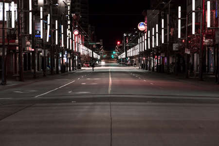 DOWNTOWN VANCOUVER, BC, CANADA - APR 05, 2020: Saturday night on an empty Granville street due to business closures amid the Covid 19 pandemic.のeditorial素材