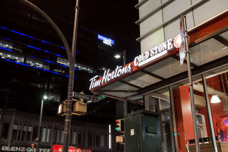 DOWNTOWN VANCOUVER, BC, CANADA - APR 05, 2020: A Tim Hortons storefront on Granville street amid shutdowns after new healthcode violations regarding the Covid 19 virus.のeditorial素材