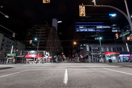 DOWNTOWN VANCOUVER, BC, CANADA - APR 05, 2020: Saturday night on an empty Granville street due to business closures amid the Covid 19 pandemic.のeditorial素材