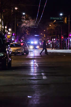 VANCOUVER, BC, CANADA - APR 5, 2020: Police attend a incident on East Hastings street in the downtown east side.のeditorial素材