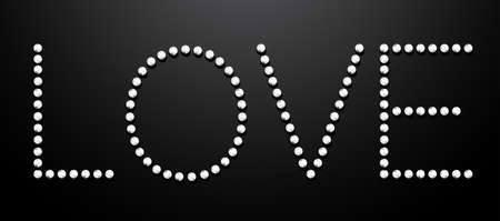 Love made from silver sequins on black background .のイラスト素材