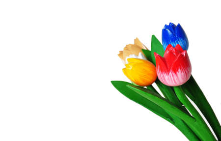 wooden tulips isolated on white backgroundの写真素材