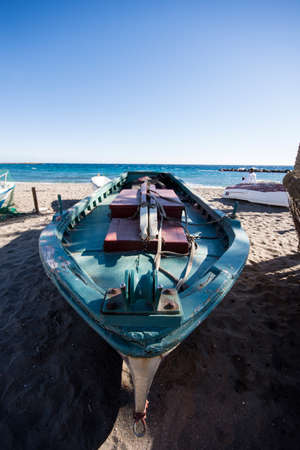 Fishermans boat on the beachの写真素材