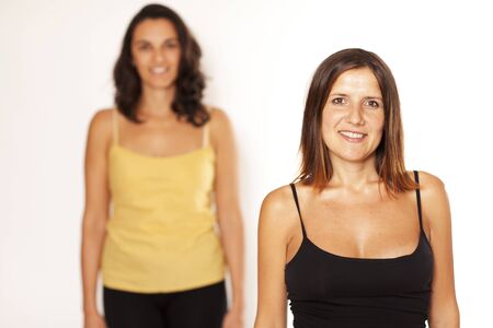 Two women in a row out of focusの写真素材