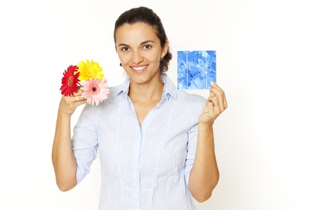 Latin woman with a solar cell and flowersの写真素材