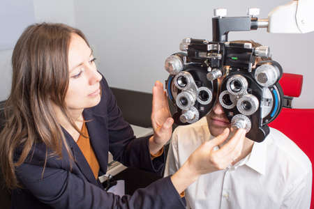 woman preparing an eye exam