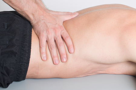 Lower back massageの写真素材