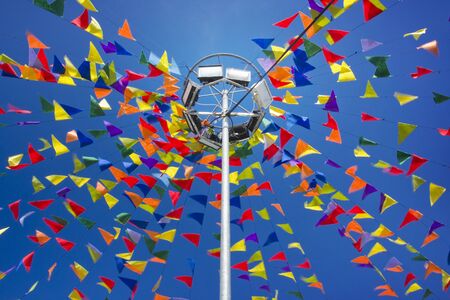 The traditional flag on a background of blue skyの写真素材