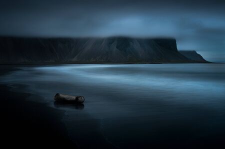 Dramatic scene on Stokksnes beach in Iceland. View to Vestrahorn mountainの写真素材