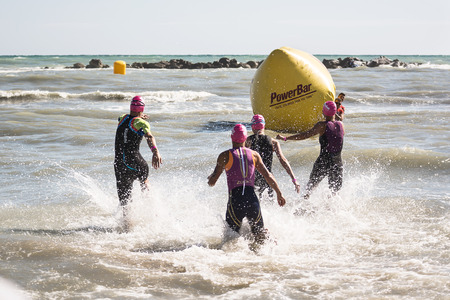 Pescara, Italy - June 18, 2017: Starting for the swimming test of the women's athletes of the Ironman 70.3 Pescara of June 18, 2017のeditorial素材