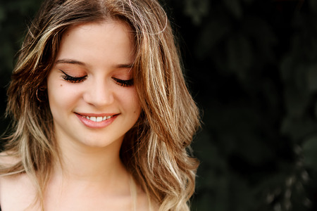 Close up of girl with the look downの写真素材