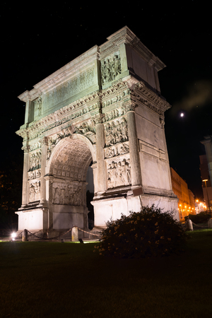 The Arch of Trajan illuminated in the night in Benevento (Italy)の写真素材