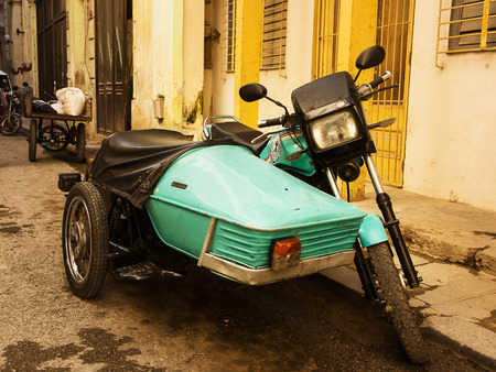 Havana, Cuba - December 11, 2017: old sidecar parked in a street of old Havanaのeditorial素材