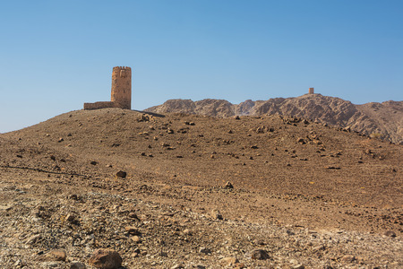 Ancient tower on top of a rocky hill in Omanのeditorial素材
