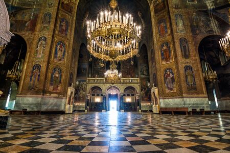 Entrance and interior of the Cathedral of St. Alexander Nevsky completely frescoed by icons of...