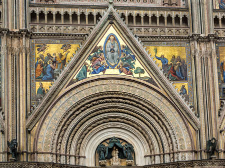 Detail of the facade of the basilica of Orvieto decorated with mosaicsのeditorial素材