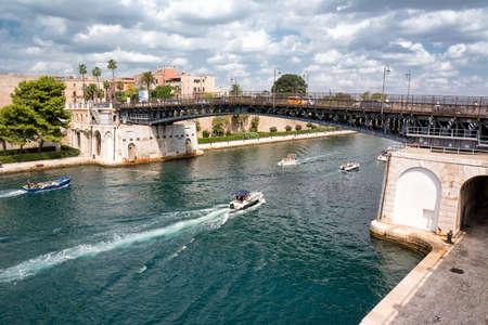 Taranto, Italy - 18 august 2021: The swing bridge of Taranto that separates the new city from the old villageのeditorial素材