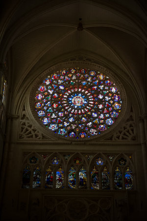 Rose window worked with colored glass inside the Cathedral of Toledo